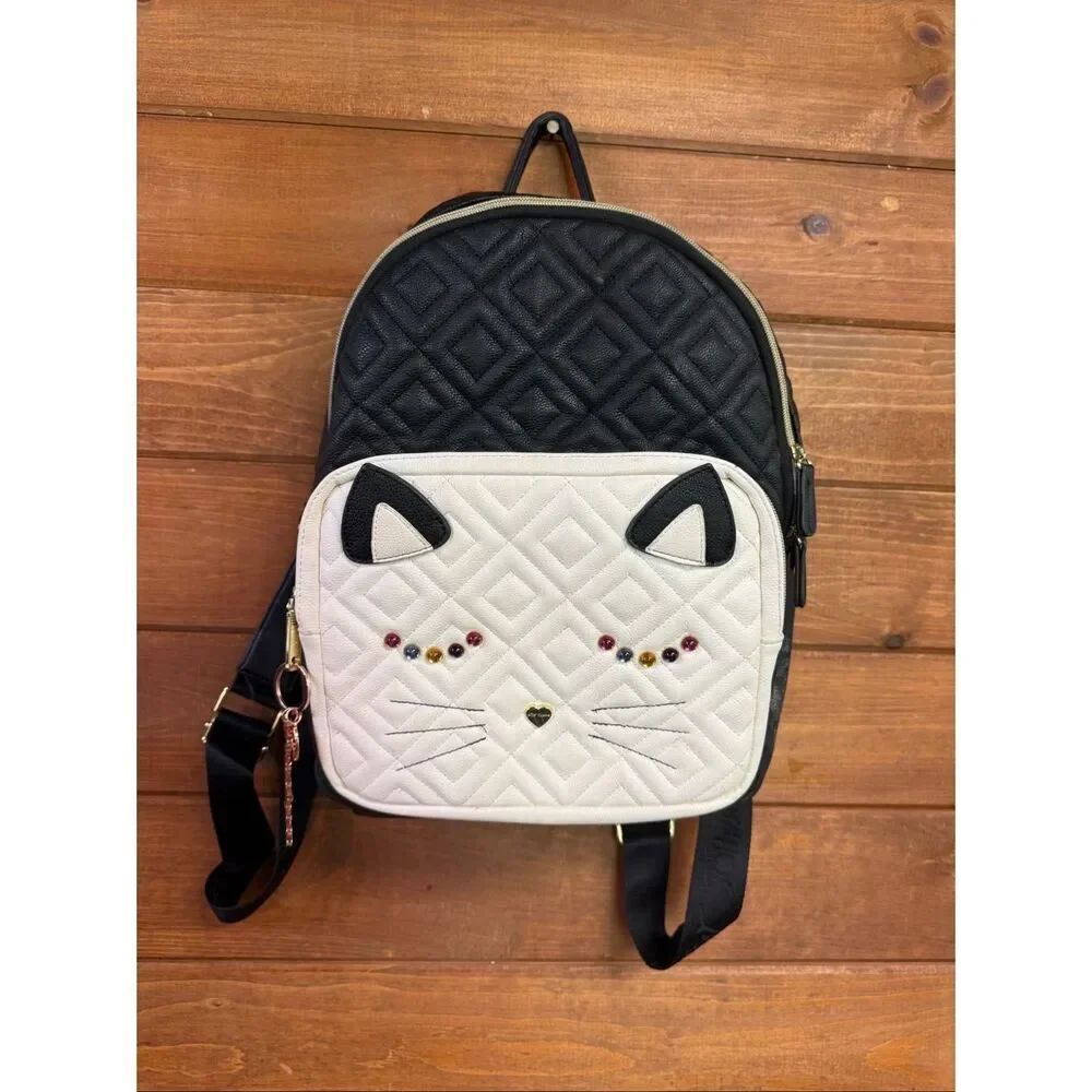 Betsey Johnson "Papparazzi" quilted backpack kitten face